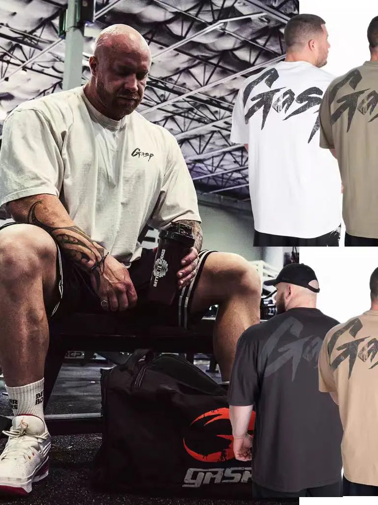 2026 Fitness man's loose sports T-shirt. Made of cotton, it is comfortable and suitable for sports enthusiasts.
